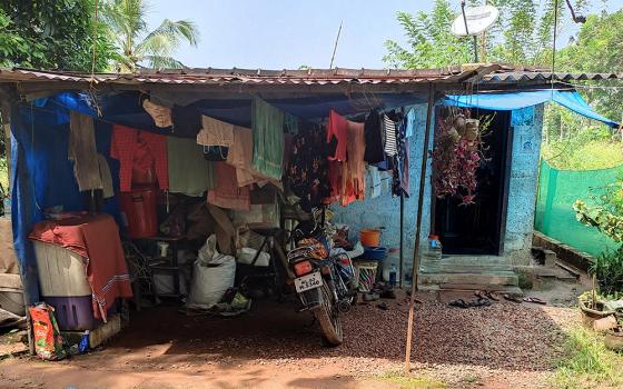 The one-room shed where a day laborer and his wife and daughter were living, when Rose Cherian Vachaparampil began the "live crib" project to build a house for the family (Courtesy of Rose Cherian Vachaparampil)