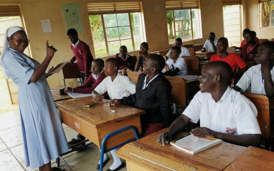 Sr. Rose Nelima interacts with students at Mbale School for the Deaf in Uganda. (Gerald Matembu)