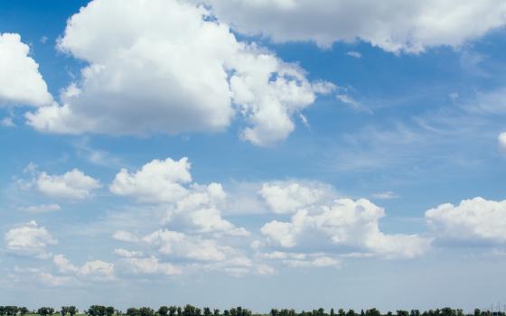 The everlasting sky stretches above us all, stretches wide and eternal. Like always. (Unsplash/Rodion Kutsaev)