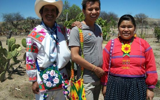 Joel, a Weavers of Hope grant student, with his parents, who are from the indigenous Huichol community in Jalisco, Mexico. His father, Armando, makes bead handicrafts. (Courtesy of Sr. Frances Smith)