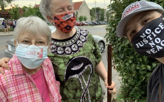 Ursuline Sr. Angela Fitzpatrick, Ursuline Sr. Michele Morek and Ursuline associate Renee Schultz take a selfie at the Juneteenth Pray on Troost event in Kansas City, Missouri.