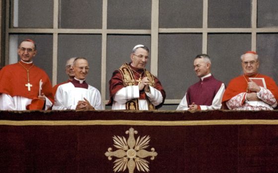 In this Saturday, Aug. 26, 1978 file photo, Pope John Paul I smiles as he appears at the central lodge of St. Peter's Basilica at The Vatican soon after his election. 