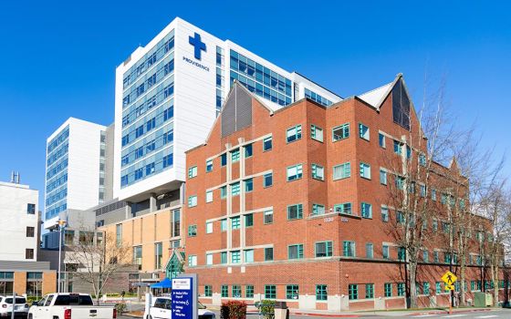 In Everett, Washington, a Providence sign is seen atop a medical center that is part of the Providence hospital system based in Renton, Washington. (Dreamstime/Clovercity)