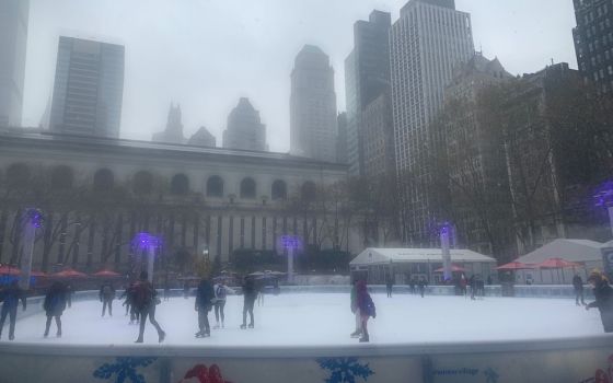Snow begins to fall on Bryant Park's ice-skating rink in New York City. (Celina Kim Chapman)