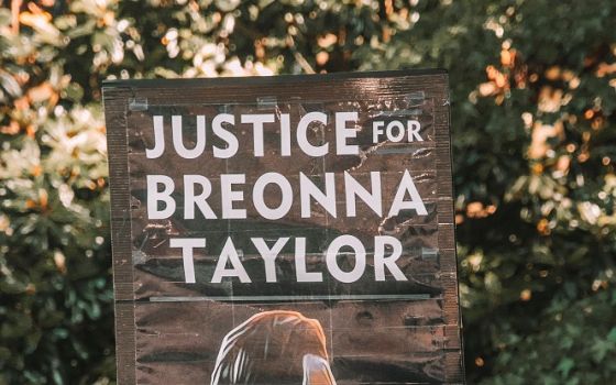 A protester holds up a sign calling for justice for Breonna Taylor at a Black Lives Matter protest in Atlanta. (Photo by Maria Oswalt on Unsplash)