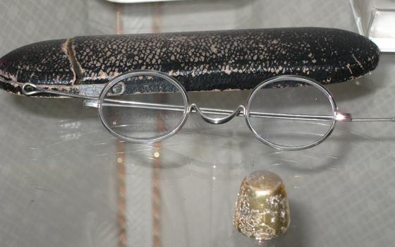 Photo of Blessed Clelia Merloni's reading glasses on display in her bedroom in the Generalate of the Apostles of the Sacred Heart of Jesus in Rome, Italy. (Sr. Doretta Jean D'Albero)