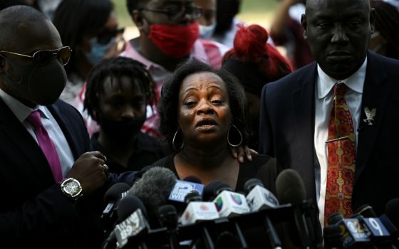 Julia Jackson (center), mother of Jacob Blake, who was shot several times in the back by a police officer, speaks during a press conference outside the Kenosha County Courthouse in Kenosha, Wisconsin, Aug. 25. (Newscom/Reuters/Stephen Maturen)
