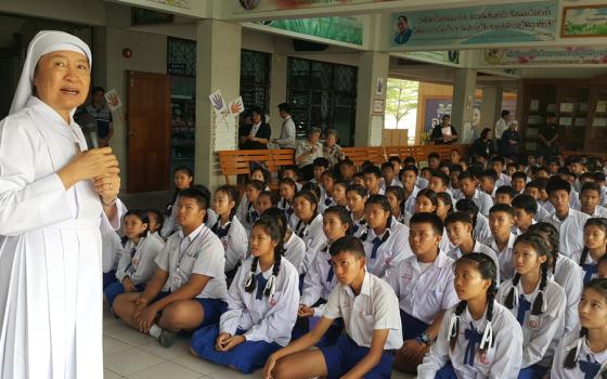 Sr. Kanlaya Trisopa, a member of the Sacred Heart of Jesus of Bangkok, coordinator of Talitha Kum Thailand and early leader in anti-trafficking efforts, gives a presentation to students to raise awareness about the dangers of trafficking in February 2017.