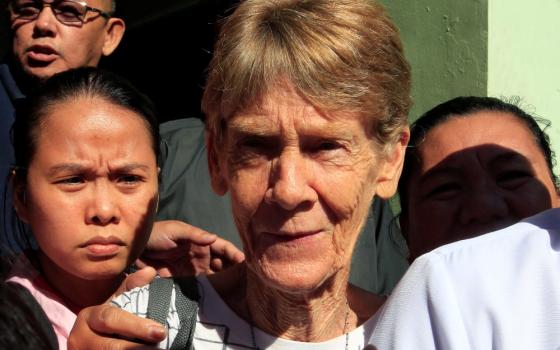 Sr. Patricia Fox, then-superior of the Sisters of Our Lady of Sion in the Philippines, speaks to the media after her April 17, 2018, release from the Bureau of Immigration headquarters in Manila. (CNS/Reuters/Romeo Ranoco)
