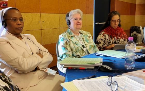 LCWR executive director Sr. Carol Zinn, second from right, listens during the International Union of Superiors General plenary in May in Rome. (Courtesy of LCWR)