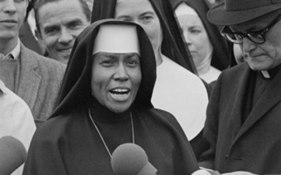 Sr. Antona Ebo delivers a statement after police halted a march to the country courthouse in Selma March 10, 1965, (AP Images/©Bettmann Corbis)