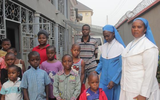 "It is a thing of joy, living with the children here," says Sr. Eucharia Chukwueke, right, director of the home. With her is Sr. Elizabeth Nwankwo, second from right. (Patrick Egwu) 
