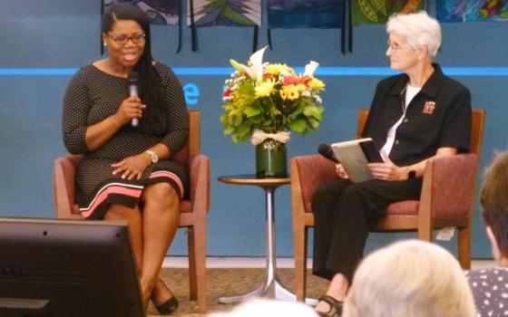 Dr. Shannen Dee Williams, left, answers questions posed by Dominican Sr. Gene Poore from the audience during an interactive webcast presentation August 5, 2017, with the Dominican Sisters of Peace. (Courtesy of Shannen Dee Williams)