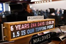 A "Climate Clock" is seen with the Maldives delegation during the closing plenary of COP27 in Sharm el-Sheikh, Egypt, Nov. 20. (Flickr/UNclimatechange)