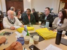 Attendees of the annual assembly of the Association of U.S. Catholic Priests discuss their ministry in the context of synodality during a table discussion on June 14 at the University of San Diego. (Dennis Sadowski)