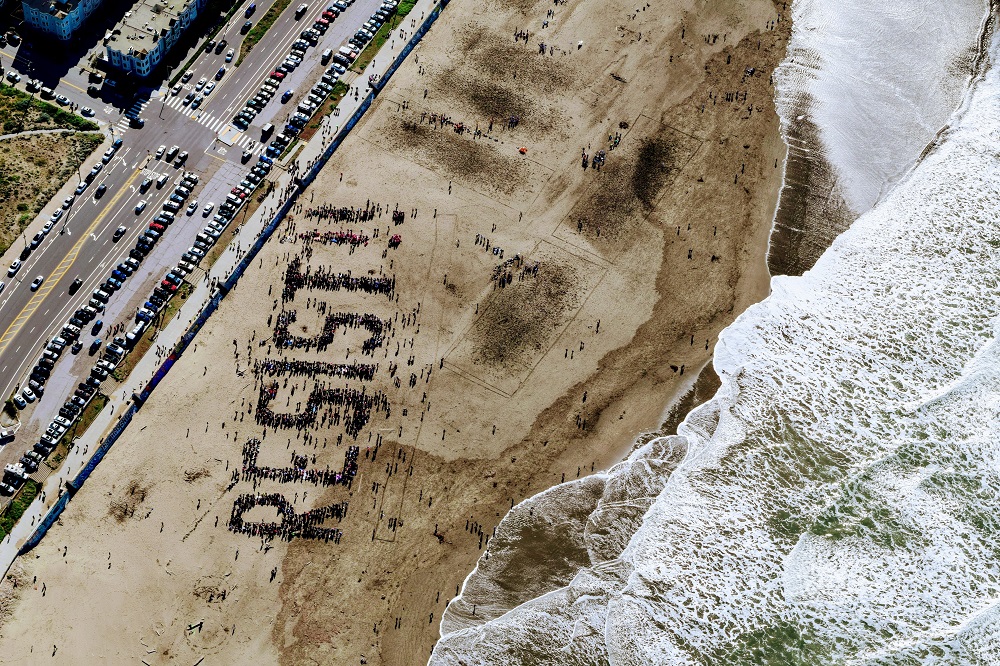 Anti-Trump protesters on Ocean Beach in San Francisco on Feb. 11, 2017