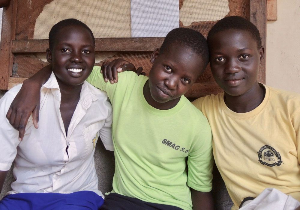 From left, Esther Ruth Modonig, Martha Akoul and Sarah Yar are high school students at St. Mary Assumpta Girls Secondary School near Adjumani.